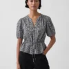 Blusa con lazo en la cintura