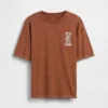 Camiseta infantil holgada con diseño gráfico