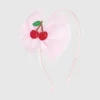 Diadema con moño de tul de Sweet Wink