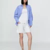 Pantalones cortos premamá de mezclilla de 7" con panel completo