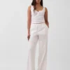 Pantalones holgados de popelín de talle medio y pierna ancha