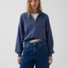 Suéter oversize de algodón texturizado con media cremallera