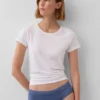 Tanga de algodón orgánico elástico con ribete de encaje