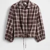 Blusa a cuadros con lazo en la cintura