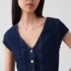 Blusa ajustada de mezclilla con mangas casquillo y peplum