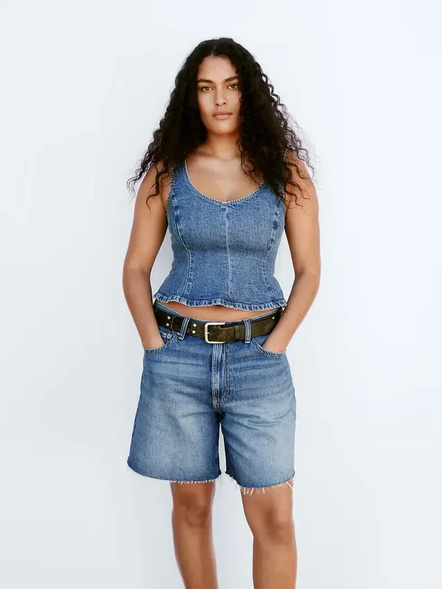 Blusa ajustada de mezclilla con peplum