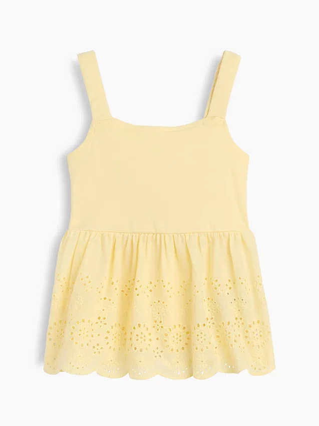 Blusa con dobladillo de ojales para bebés y niños pequeños