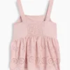 Blusa con dobladillo de ojales para bebés y niños pequeños