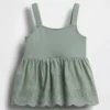 Blusa con dobladillo de ojales para bebés y niños pequeños