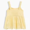 Blusa con dobladillo de ojales para bebés y niños pequeños