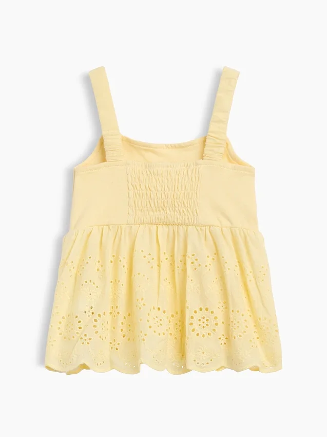 Blusa con dobladillo de ojales para bebés y niños pequeños