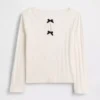 Blusa con lazo y punto calado para bebés y niños