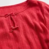 Blusa con lazo y punto calado para bebés y niños