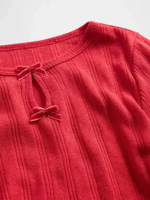 Blusa con lazo y punto calado para bebés y niños