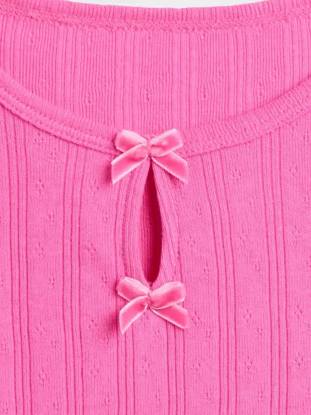 Blusa con lazo y punto calado para bebés y niños