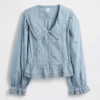 Blusa con peplum, cuello en V y cuello