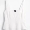 Blusa con peplum de mezcla de lino