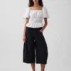 Blusa con peplum y cuello cuadrado