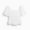 Blusa con peplum y cuello cuadrado