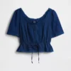 Blusa con peplum y ribete de encaje