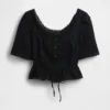 Blusa con peplum y ribete de encaje