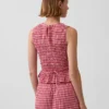 Blusa corta con peplum de cuadros vichy fruncida
