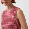 Blusa corta con peplum de cuadros vichy fruncida