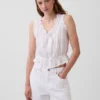 Blusa corta con peplum y lazo frontal con ojales