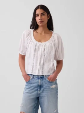 Blusa corta con pinzas y mangas hasta el codo