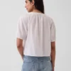 Blusa corta con pinzas y mangas hasta el codo