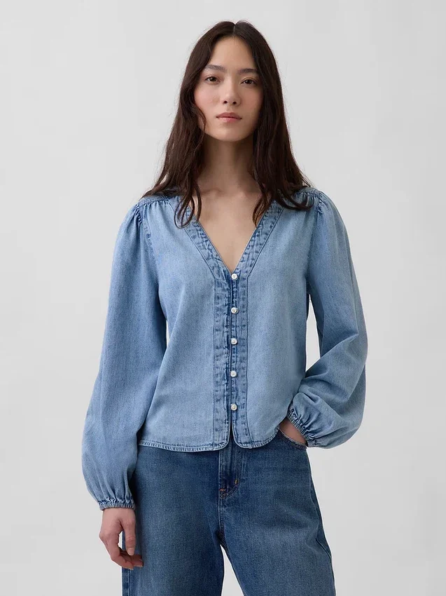 Blusa de mezclilla con mangas abullonadas