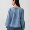 Blusa de mezclilla con mangas abullonadas