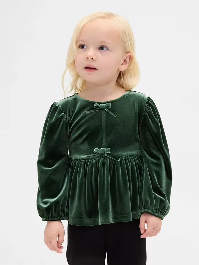 Blusa de terciopelo con moño para bebés y niños pequeños