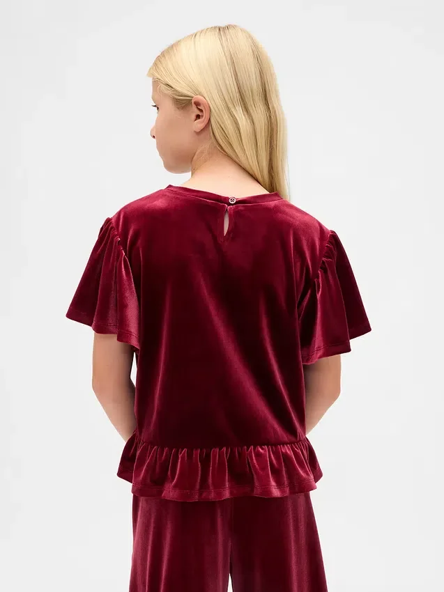Blusa de terciopelo con peplum para niños