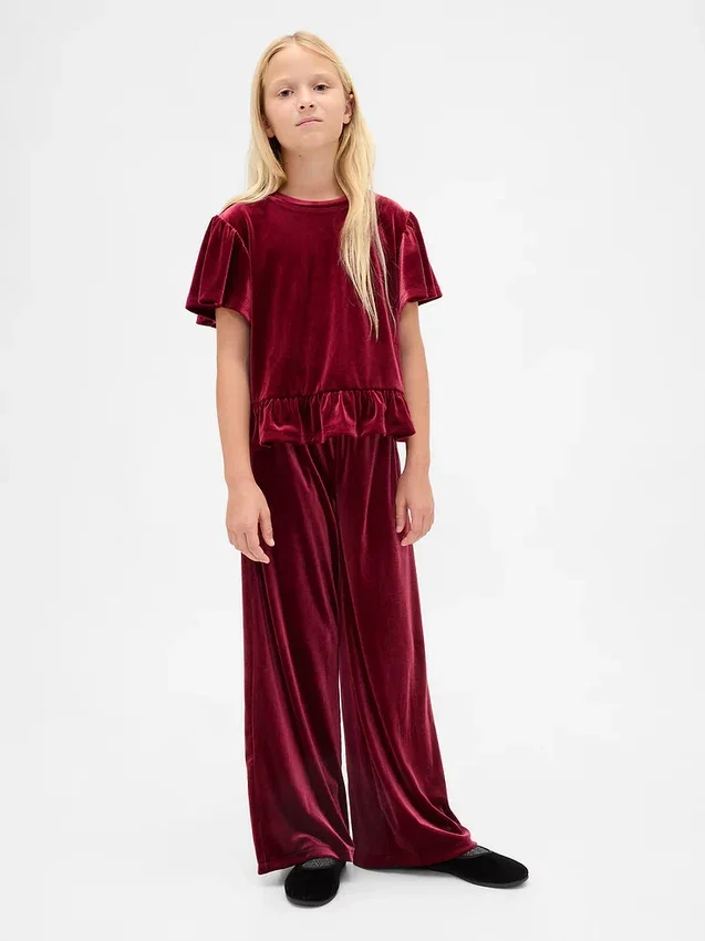 Blusa de terciopelo con peplum para niños