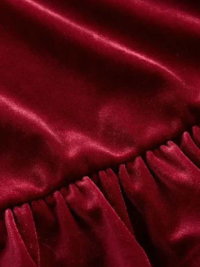 Blusa de terciopelo con peplum para niños