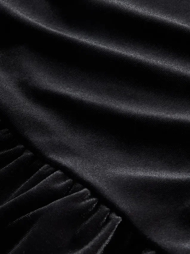 Blusa de terciopelo con peplum para niños