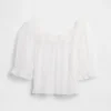 Blusa de tul transparente con bordados