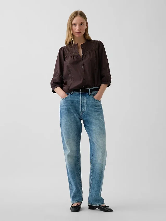 Blusa holgada con cierre de botones y ribete de encaje