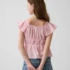 Blusa infantil con mangas con volantes y botones al frente