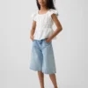 Blusa infantil con mangas con volantes y botones al frente