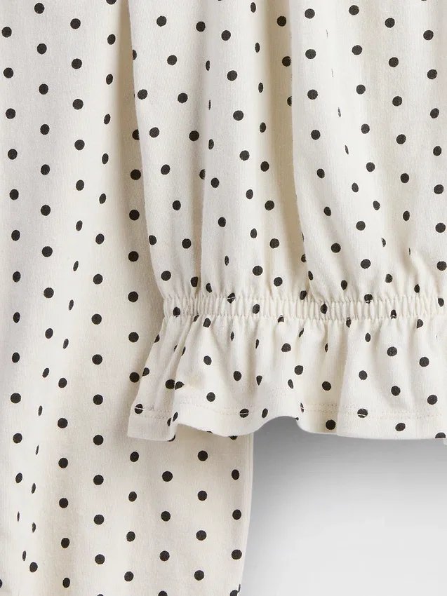Blusa infantil con peplum arrugado
