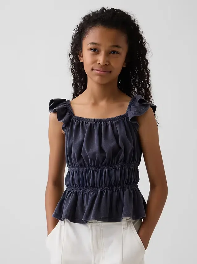 Blusa infantil con peplum, mangas con volantes y fruncido