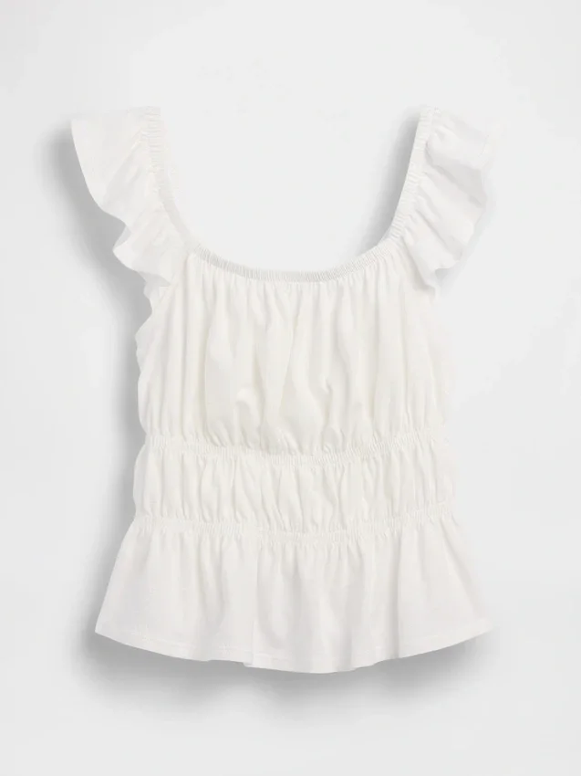 Blusa infantil con peplum, mangas con volantes y fruncido
