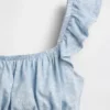 Blusa infantil con peplum, mangas con volantes y fruncido