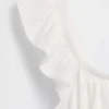Blusa infantil con peplum, mangas con volantes y fruncido