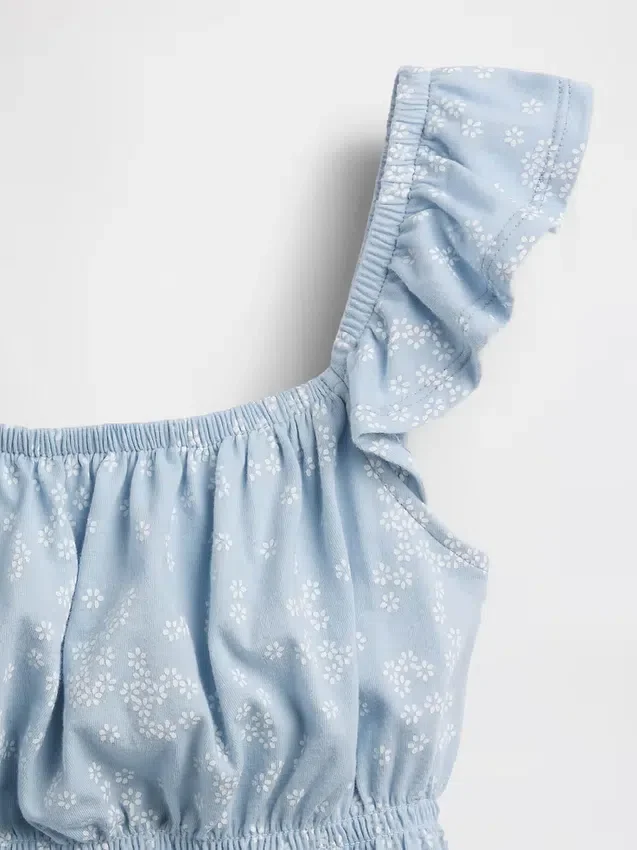 Blusa infantil con peplum, mangas con volantes y fruncido