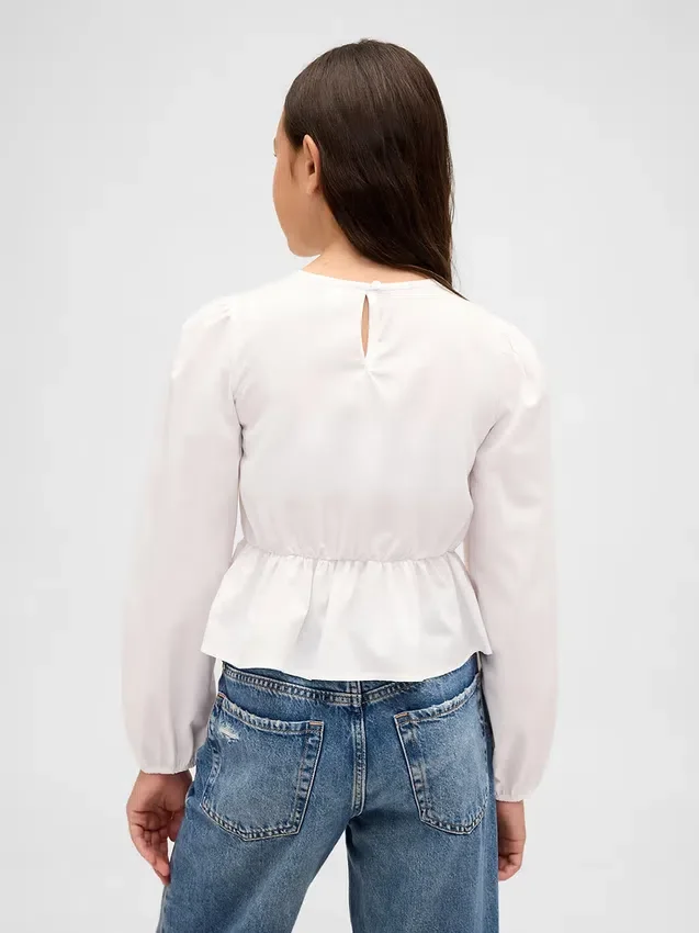 Blusa infantil con peplum y fruncidos