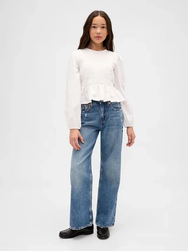 Blusa infantil con peplum y fruncidos