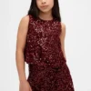 Blusa infantil con volantes y lentejuelas